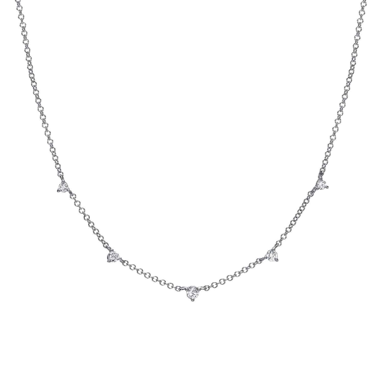 Introducing the Duplicate SKU: Diamond Luna Necklace (NEC-445-W), a timeless piece from Janet Heller Fine Jewelry, priced at $580.00. This silver chain necklace features five evenly spaced small round clear gemstones, with a simple and delicate design that emphasizes the subtle sparkle of each gem along its fine chain, beautifully showcased on a plain white background. For custom jewelry options or inquiries about this necklace, please contact us directly.
