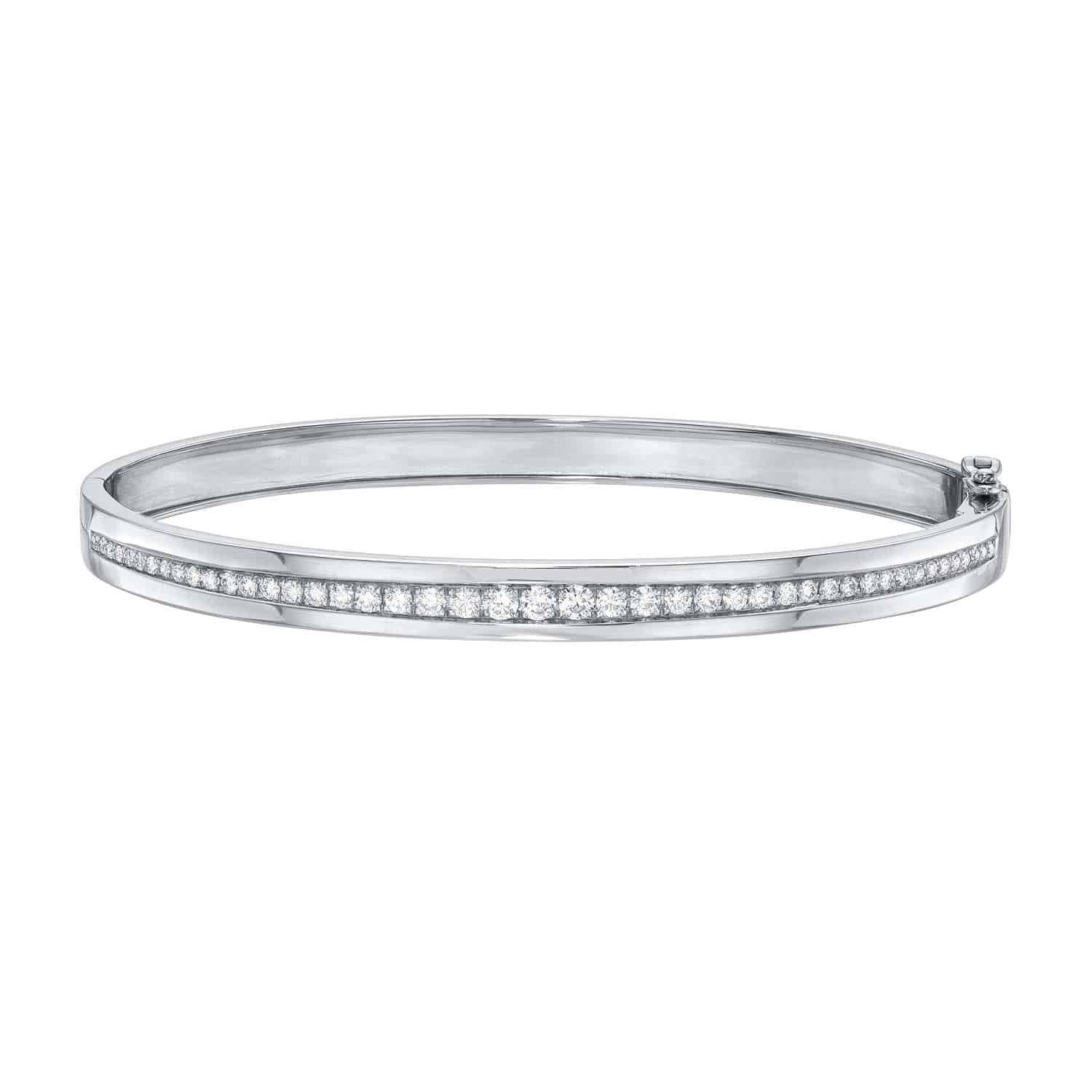 Certainly! Here’s a revised version of the sentence using your product data: The Single Row Diamond Bangle features a sleek silver design with a single row of sparkling diamonds set along the center. This elegant bracelet, complete with a simple clasp, is part of the Janet Heller Fine Jewelry collection—ideal for custom jewelry or for those with jewelry inquiries. Priced at $2,513.00.