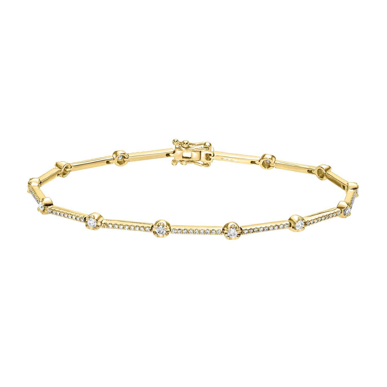 A delicate Segmented Diamond Bracelet, crafted from slender gold and adorned with evenly spaced round diamonds, features a secure clasp closure—an elegant piece offered by Janet Heller Fine Jewelry, celebrated for exquisite craftsmanship.