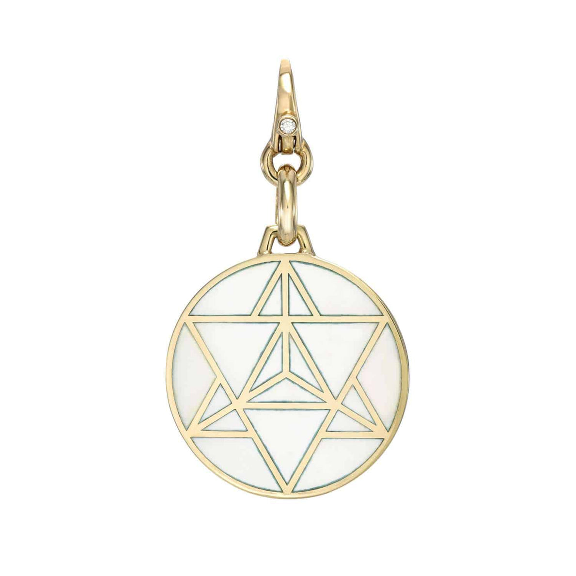 The White Enamel Star Charm by Janet Heller Fine Jewelry is crafted in 14KT gold.  The circular pendant showcases geometric line patterns forming a star on a white enamel background.  The clasp, featuring a single diamond, clips easily onto various Janet Heller Fine Jewelry chains and necklaces.