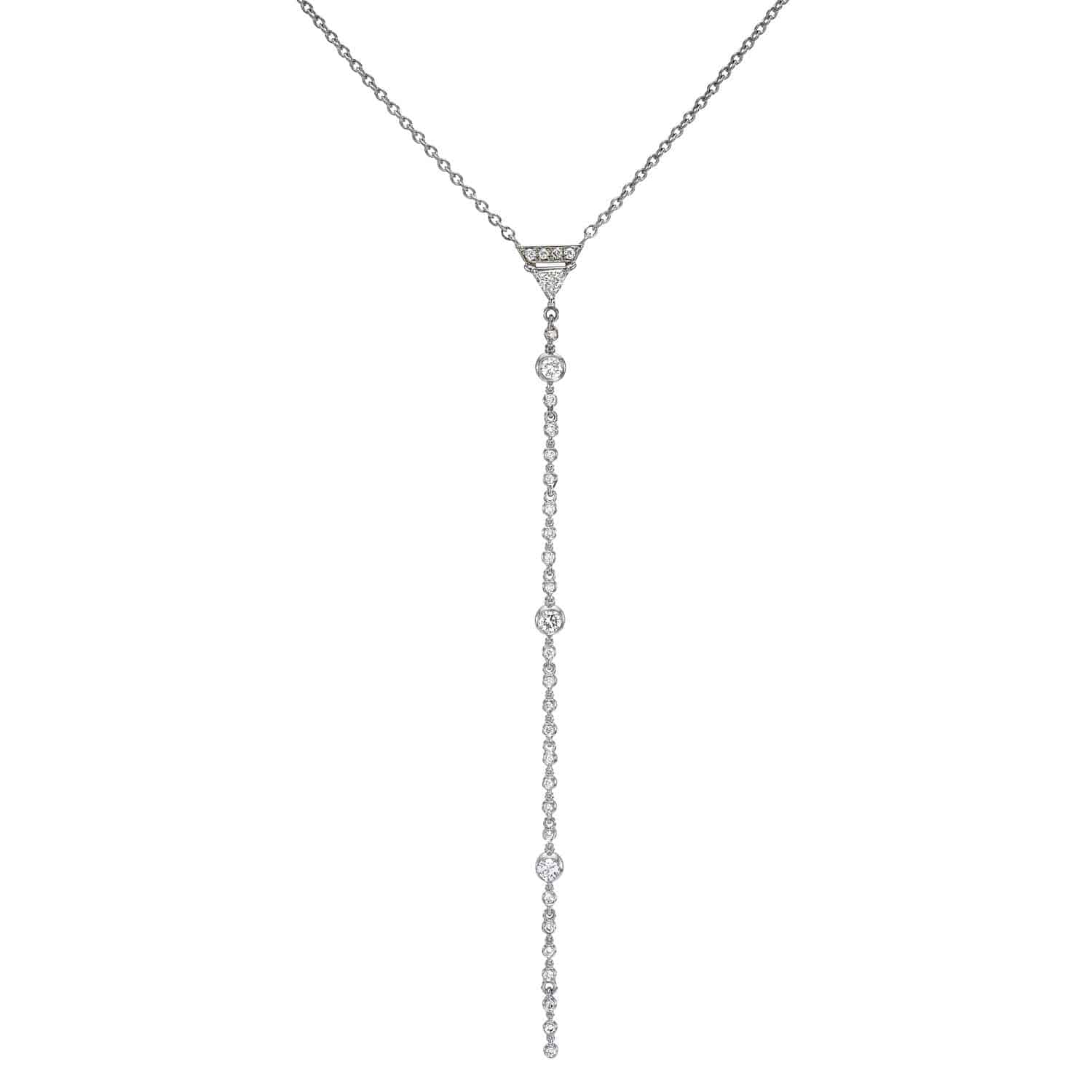 Introducing the Diamond Josie Lariat from Janet Heller Fine Jewelry—a delicate silver necklace showcasing a thin chain with a long vertical drop pendant, elegantly adorned with evenly spaced round diamonds.
