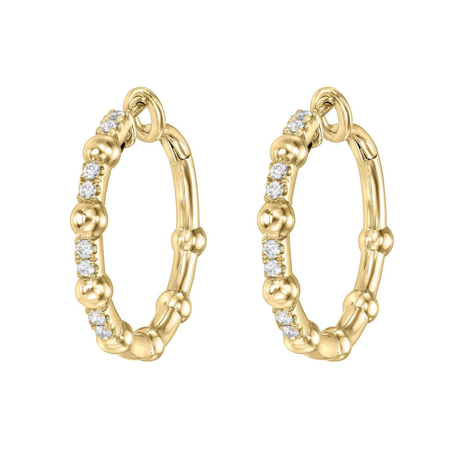 A pair of Diamond Celeste Hoops, featuring a beaded design with small round diamonds set along the front, embodies the elegance of fine jewelry by Janet Heller.