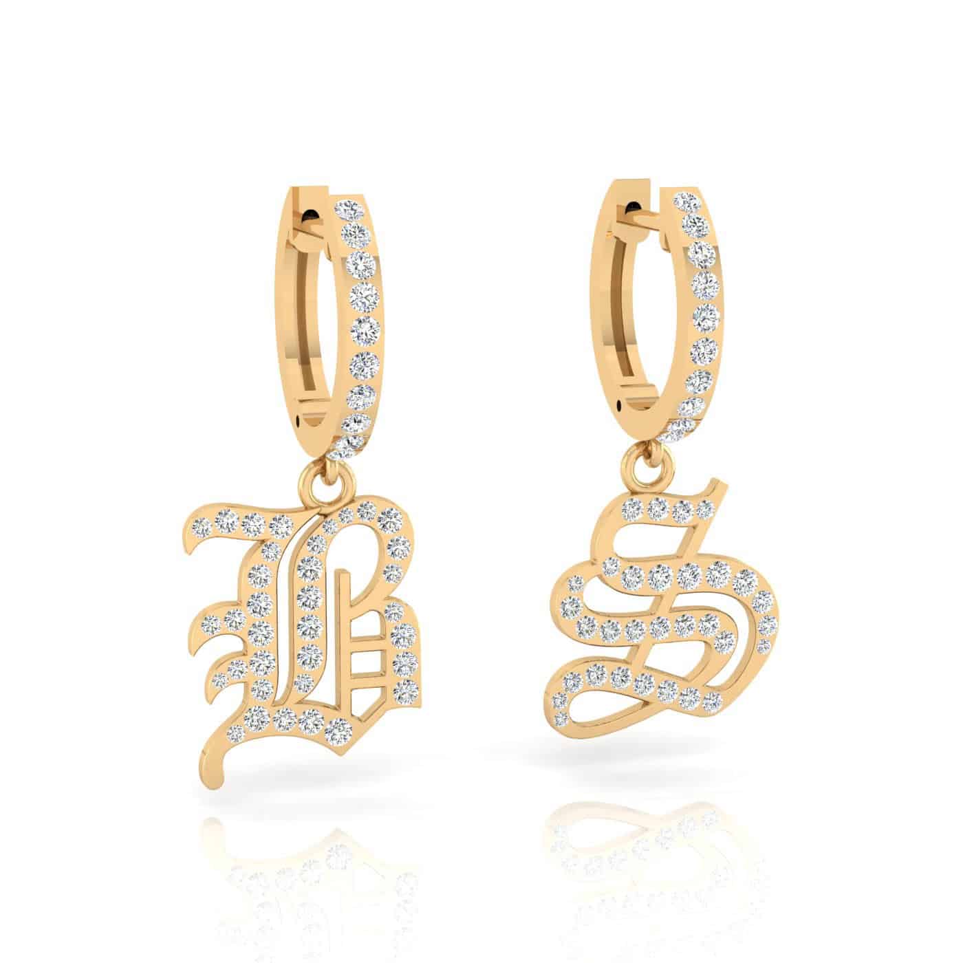 Large Old English Initial Huggies in polished gold feature dangling B and S initials designed in ornate Old English script, each adorned with sparkling diamonds. Crafted as elegant 14KT earrings, these statement pieces are perfect for adding a personalized touch to any look.
